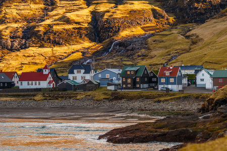 Tjornuvik, Faroe Islands - 02 May 2018: View of the Tjornuvik on Streymoy island. A small village situated on the slope of a hill.のeditorial素材