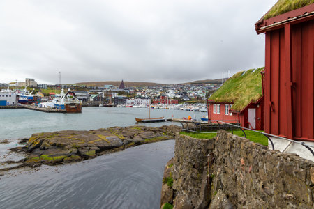 Thorshavn, Faroe Islands, Denmark - 03 May 2018: Thorshavn city, capital of The Faroe Islands. Colorful tenement houses and a port with moored yachts and boats.のeditorial素材