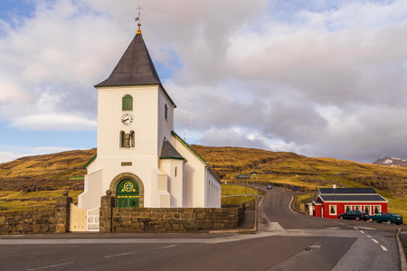 Eidi, Faroe Islands, Denmark - 03 May 2018: Eidi Church on a hill. in a small village on Streymoy islands.のeditorial素材