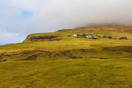 View of the Gasadalur on Vagar island. A small village situated on the slope of a hill. Vagar, Faroe Islands, Denmark.の写真素材