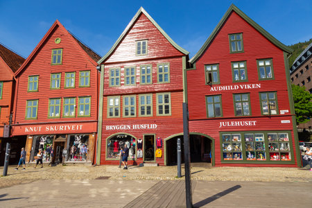 Bergen, Norway - 27 May 2018: View of the Bryggen series of Hanseatic heritage commercial buildings lining up the eastern side of Vagen harbor.のeditorial素材