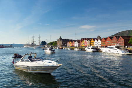 Bergen, Norway- 27 May 2018: View of the Bryggen, series of Hanseatic heritage commercial buildings lining up the eastern side of Vagen harbor.のeditorial素材