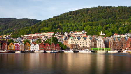 Bergen, Norway- 27 May 2018: View of the Bryggen, series of Hanseatic heritage commercial buildings lining up the eastern side of Vagen harbor.のeditorial素材