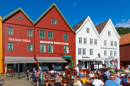 Bergen, Norway- 28 May 2018: View of the Bryggen, series of Hanseatic heritage commercial buildings lining up the eastern side of Vagen harbor.のeditorial素材
