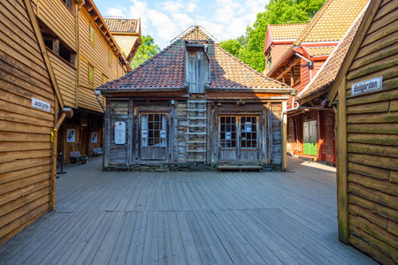 Bergen, Norway- 27 May 2018: View of the Bryggen, series of Hanseatic heritage commercial buildings lining up the eastern side of Vagen harbor.のeditorial素材