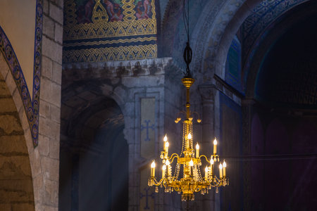 Lviv, Ukraine - 09 June 2018: The sun rays shining into Christianity in the Armenian Cathedral of the Assumption of Mary in Lviv.のeditorial素材