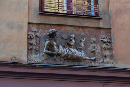 Lviv, Ukraine - 10 June 2018: The facade of a beautiful historic tenement house. Architecture of Lviv. City center.のeditorial素材