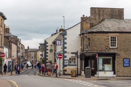 Kirkby Lonsdale, Cumbria, England - August 12, 2018: Narrow streets in the market town. Traditional stone and white houses.のeditorial素材