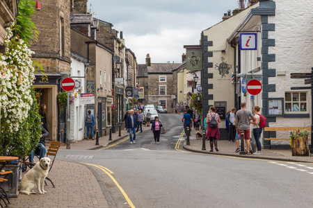 Kirkby Lonsdale, Cumbria, England - August 12, 2018: Narrow streets in the market town. Traditional stone and white houses.のeditorial素材