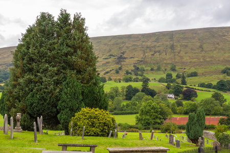 Dent, Cumbria, England, UK - 12 August 2018: Cemetery at the Saint Andrew Church, active Anglican...