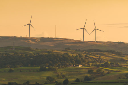 Wind power plants in the Yorkshire Dales ,. Beautiful sunset. Sedbergh, UK.