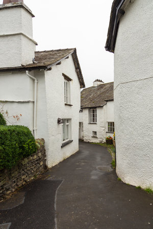 Facade of a white buildings in the village of Hawkshead in the South Lakeland, England, UKの写真素材