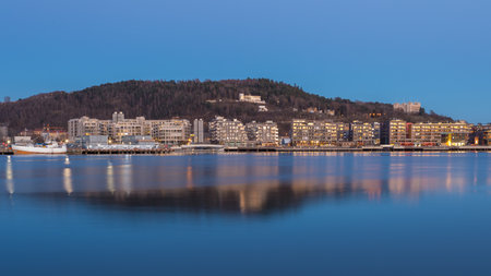 Oslo, Norway - 14 April 2019: Yachts and boats moored off in marina in Oslo. Capital city of Norway. beautiful sunset.のeditorial素材