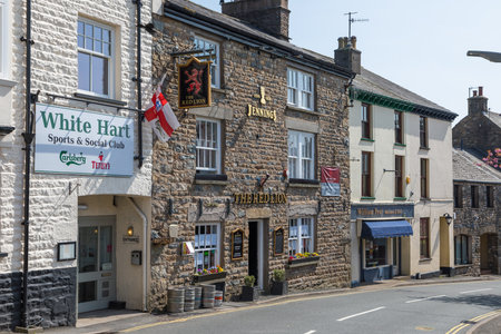 Sedbergh, Yorkshire, UK - 20 April 2019: Facade of a building in the village of Sedbergh . Sunny...