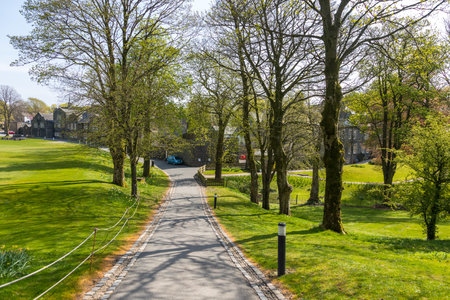 Sedbergh, Yorkshire, UK - April 20, 2019: View of the buildings of the Sedbergh village. beautiful garden. Sunny spring day. Yorkshire Dales, UKのeditorial素材