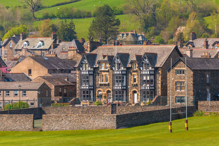 Sedbergh, Yorkshire, UK - April 20, 2019: View of the buildings of the Sedbergh village. beautiful garden. Sunny spring day. Sedbergh, Yorkshire Dales, UKのeditorial素材