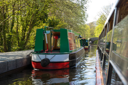 Llangollen, Dengighshire Wales - 21 April 2019: Narrow boats on the Llangollen Canal as it crosses the Pontcysyllte aquaduct, a world heritage site.のeditorial素材
