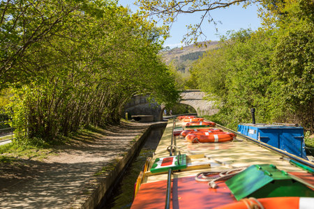 Llangollen, Dengighshire Wales - 21 April 2019: Narrow boats on the Llangollen Canal as it crosses the Pontcysyllte aquaduct, a world heritage site.のeditorial素材