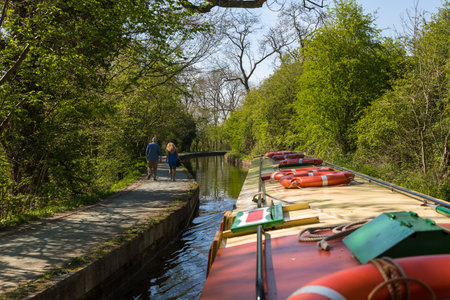Llangollen, Dengighshire Wales - 21 April 2019: Narrow boats on the Llangollen Canal as it crosses the Pontcysyllte aquaduct, a world heritage site.のeditorial素材