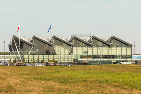 POLAND, GDANSK - 15 August 2019: Lech Walesa airport terminal building in Gdansk. Modern glass building.のeditorial素材