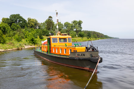 Swibno, Sobieszewska Island, Poland - 15 June 2019: Small ferry on Vistula River.のeditorial素材
