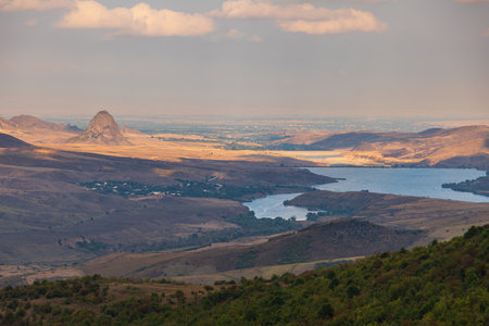 Sunset over Joghaz Water Reservoir in the Caucasus Mountain. Beautiful landscape. Armenia.