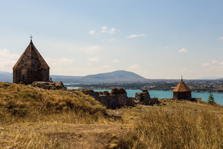 View of the Sevanavank, monastic complex located on the shore Lake Sevan. Surp Arakelots meaning the Holy Apostles. Sevan, Armenia.の写真素材