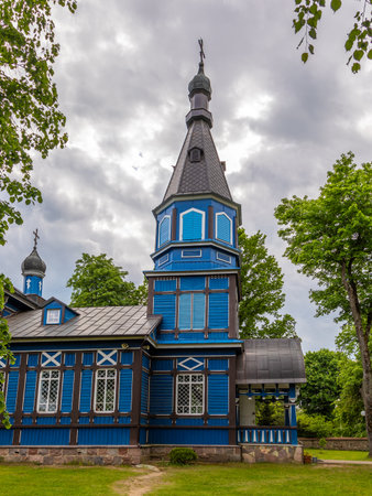 Traditional blue wooden Orthodox church in Puchly village, Podlasie region, Poland.の写真素材