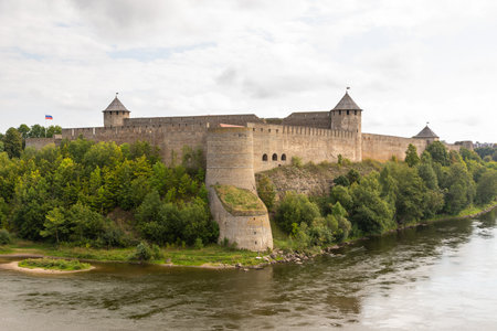 Ivangorod Fortress on the opposite bank of Narva River viewed from Narva, Estonia.の写真素材