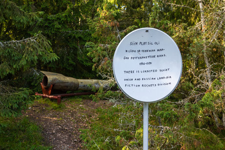 Lahemaa, Estonia â September 01, 2021: Information sign and old rocket remains marking a former Soviet land-air rocket site located in a forest area of Lahemaa National Park.のeditorial素材