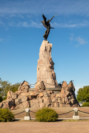 Tallinn, Estonia â September 02, 2021: A historic war memorial with an angel statue stands on a stone pedestal in a public park.のeditorial素材