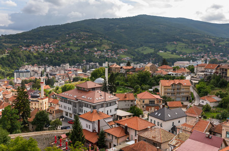 Travnik, Bosnia and Hercegovina - August 24, 2022: Travnik cityscape with traditional and modern buildings nestled in mountain valley.のeditorial素材