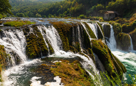 Una River waterfalls showing natural beauty and flowing water creating a serene landscape with a...