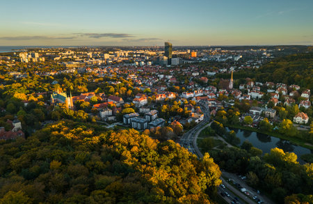 Gdansk, Poland - 09 October 2022: Gdansk cityscape from above showing urban area, buildings, green...