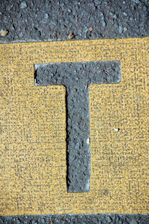 letter t in the roadの写真素材