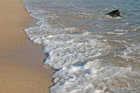 Footprints going over a sand duneの写真素材