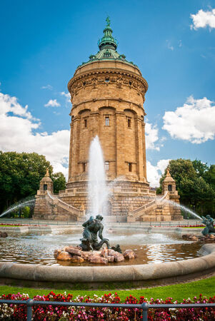Water Tower in Mannheim with fountain and flowers on the foregroundの写真素材