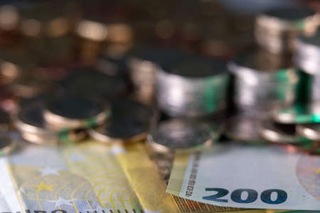 Euro Coins on Banknotes, European Monetary Currency. Cash and liquidity