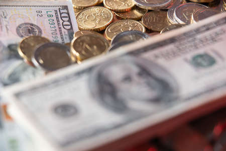 Euro Coins and Dollar Bills. Currency Exchange from Europe to United States of America