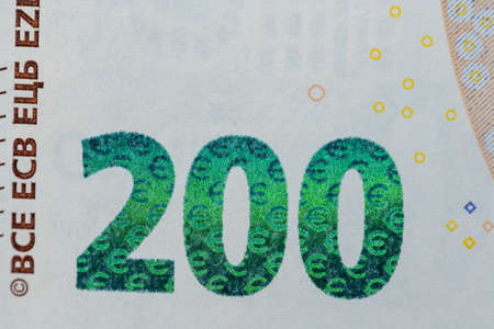 Two Hundred Euro Banknotes, closeup of Euro Bills and design of yellow Banknote from European Central Bankの写真素材