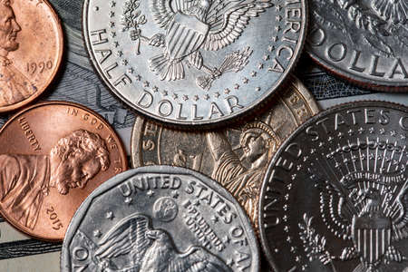 Half Dollar and Dollar Coins from USA, United States of America. US Dollars, Cash Money closeupの写真素材