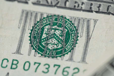 Closeup of twenty dollar banknote. TWENTY writing on banknote. US dollar currency to pay bills and...