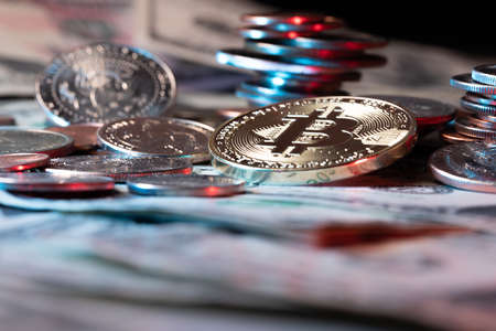 Bitcoin next to dollar coins. Crypto currency blockchain technology for next generation payment...