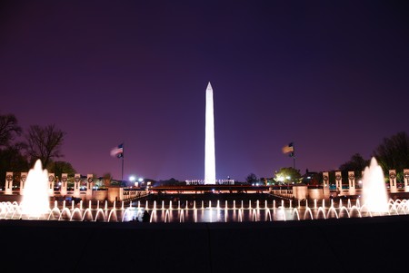 Washington monument and WWII memorial with fountains and light at dusk, Washington DC.のeditorial素材