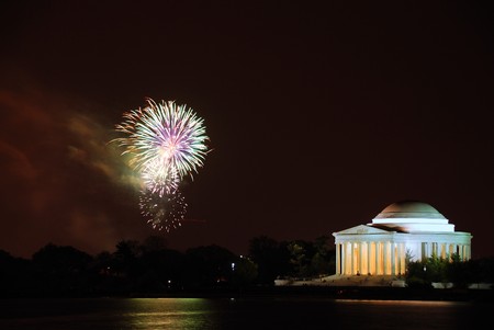 Thomas Jefferson Memorial illuminated with light and fireworks in cherry blossom festival. Washington DC.のeditorial素材