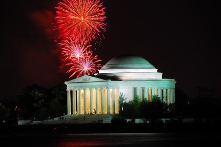Thomas Jefferson Memorial illuminated with light and fireworks. Washington DC.のeditorial素材