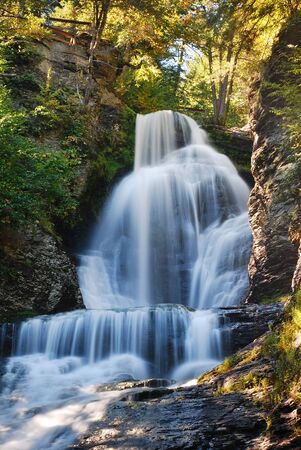 Waterfall of Digman Falls with rock and woods in Autumn.の写真素材
