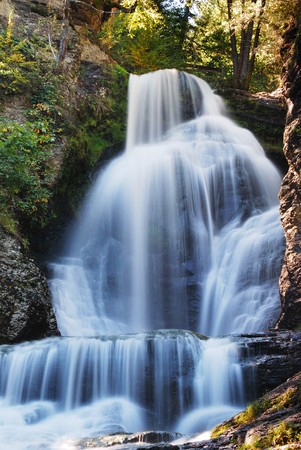 Waterfall in Autumn mountain with woods, foliage and rocks. Digman Fall of Pennsylvaniaの写真素材