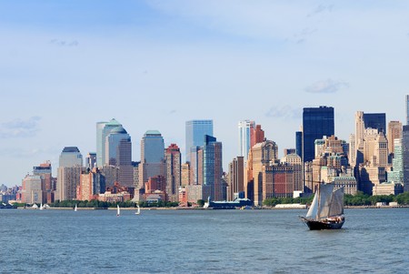 New York City Manhattan skyline with skyscrapers and sailing boatの写真素材
