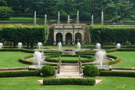 Fountains in garden with green lawn from Longwood Garden, Pennsylvania. の写真素材